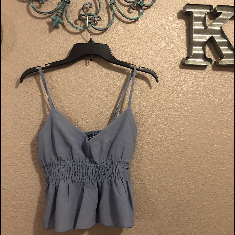 Cute dusty blue peplum top NWOT Size M